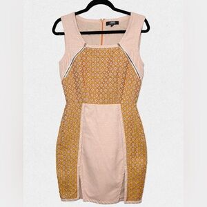 Saunder orange textile dress.